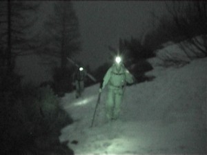 Skiers in the Dark